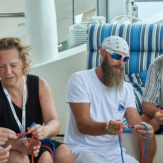 How can knots tying be an entertainment onboard a cruise ship?